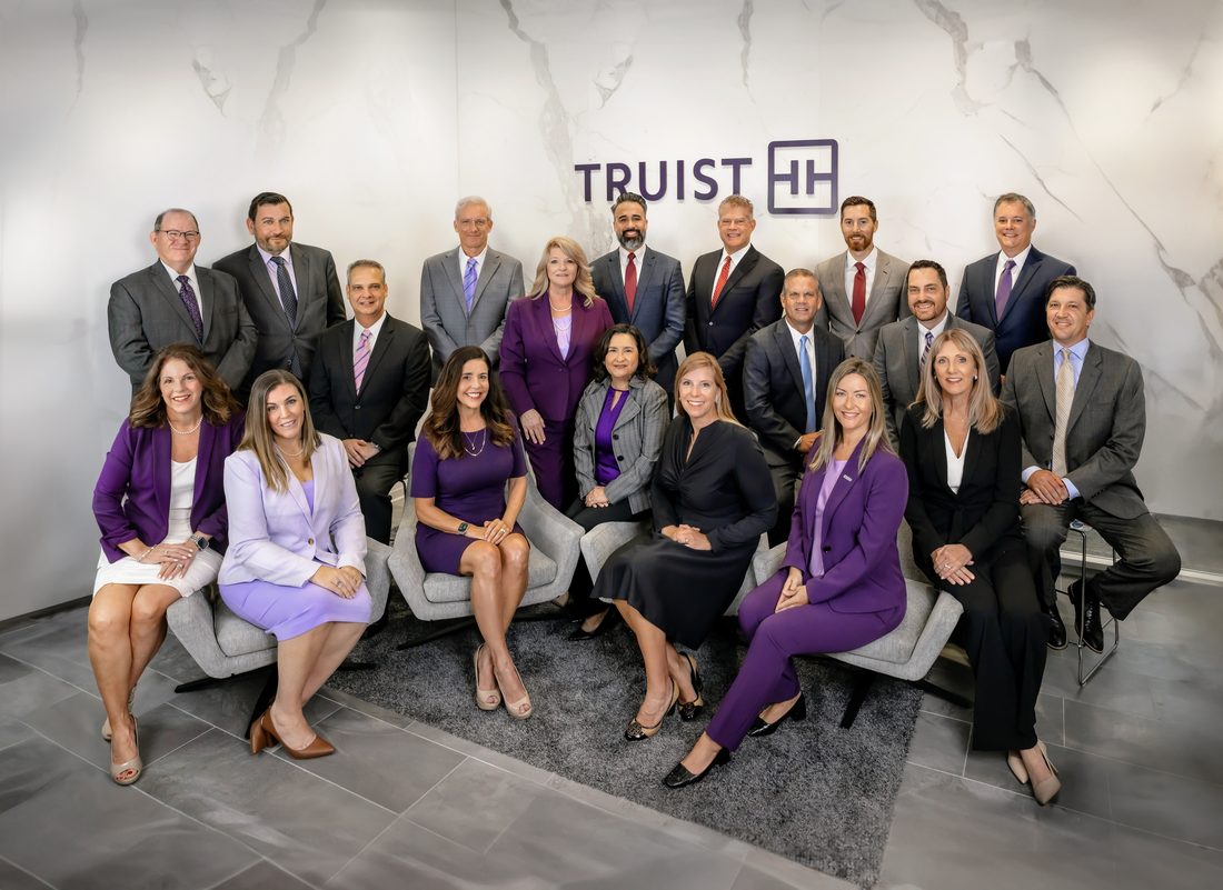 Corporate group portrait in an office lobby