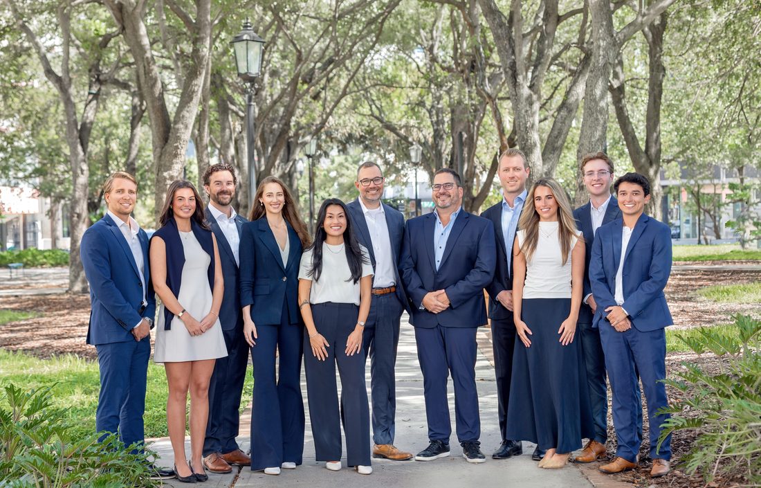 Business team group portrait outdoors