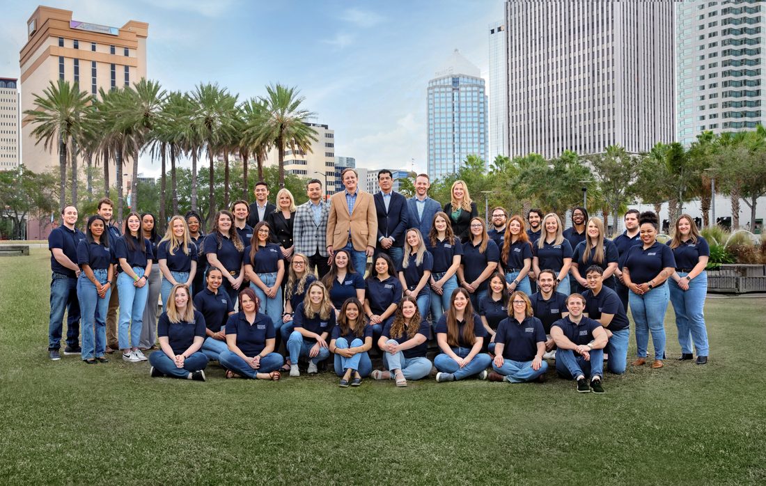 Vinson Law team portrait outdoors in downtown Tampa