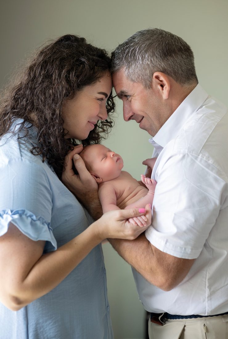 Parents with their newborn baby