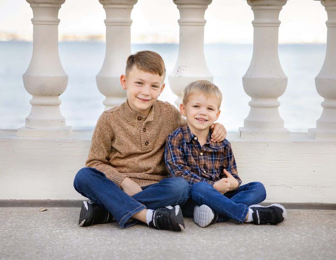 Two brothers by the water